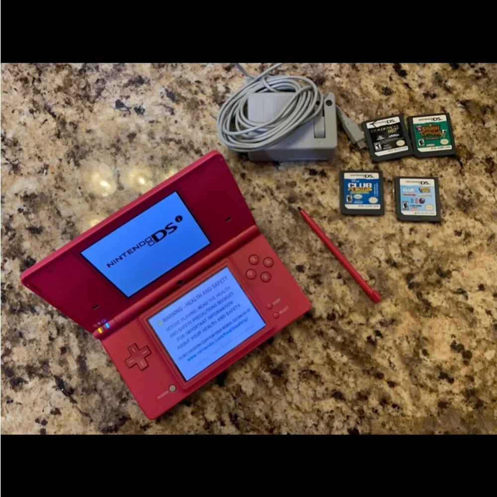 DS Pink Console, Stylus  Pen, Four (4) Games & Charger